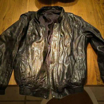 Céline's father's black leather jacket.
